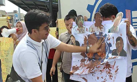 Progressive youth groups and concerned residents of Davao City staged a picket in front of the Department of Public Works and Highways (DPWH) District Engineering Office along Guerrero Street on Monday morning, September 8, 2025.