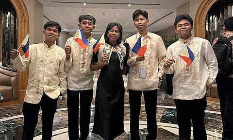 Five young achievers from Montevista National Stand-Alone Senior High School, Davao de Oro, wave their Philippine flaglets high at the Asiarope Olympiad in Kuala Lumpur, Malaysia held from August 30 to Sept 2, 2025. (Not in order) Lady Gwenevere P. Montaño, Neil Justin A. Elbanbuena, Kevin C. Relampago, Cydric Anthony M. Aljas, and Russel P. Tantoy brought home multiple silver awards in Mathematics, Science, and Writing.