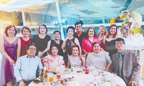 FAMILY. Celebrant Ellen Dosdos-Climaco (center) with (from left) Nicnic, May Ann C. Atienza, Christine and Jerry Climaco. Back row (from left): Tessie Javier, Oling Garcia, Gina Kahler, Marissa Salcedo, Virgie Cuenco, Ronald Dongog, Bebie Uy, Gemma Agustin and Inday Zaballa.