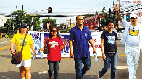 PRESS FREEDOM. Celebrations of past Cebu Press Freedom Week started with a parade. Inset: Members of Cebu media kick off the celebration of the Cebu Press Freedom Week with a Mass on Sunday, Sept. 21, 2025. /