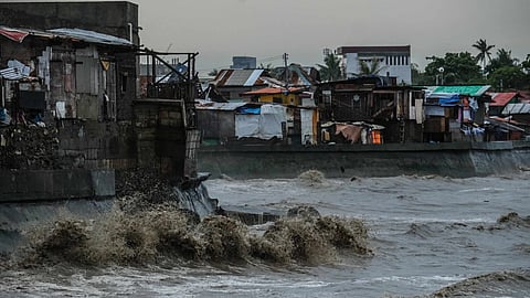 Strong waves brought by Typhoon Opong continued to hit the coastal area of Barangay Dumlog, Talisay City, as of September 26, 2025. (Photo by Juan Carlo de Vela)