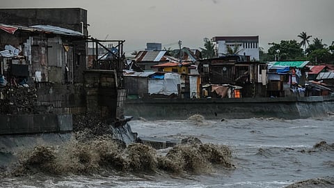 Strong waves brought by Typhoon Opong continued to hit the coastal area of Barangay Dumlog, Talisay City, as of September 26, 2025. (Juan Carlo de Vela)