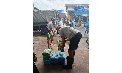 The local government of Masantol town, under the directive of Mayor Dan Guintu, distributes sacks of rice to flood-affected residents at the Bebe Anac Evacuation Center and Barangays Malauli, San Nicolas, and Sta. Monica. Masantol PIO photo