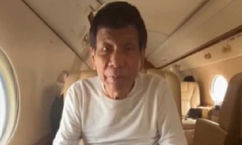 Former president Rodrigo Duterte on board a chartered flight to The Hague, Netherlands on March 12, 2025. (Photo courtesy of Senator Bong Go)