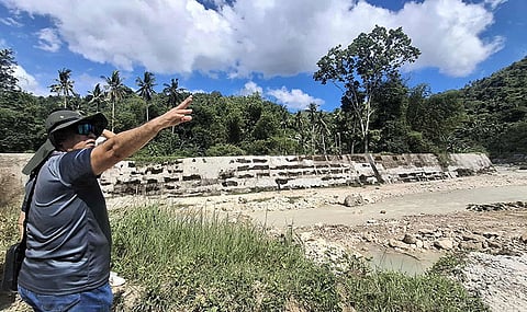 NBI inspects ‘anomalous’ flood control projects in Malabuyoc, finds key sections completed