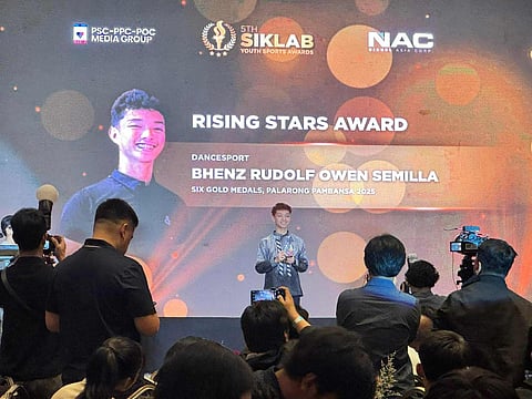 RISING STAR. Davao’s Bhenz Rudolf Owen Semilla beams as he holds his Rising Stars Award trophy during the 5th Siklab Youth Sports Awards on Saturday, October 11, 2025, at the Diamond Hotel Manila. The 17-year-old Palarong Pambansa multiple gold medalist in dancesports was among several young athletes from various sports recognized for their outstanding achievements.