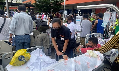 THANK YOU, DEAR FRONTLINERS! Amid the shaking and fear, health workers at the Southern Philippines Medical Center (SPMC) in Davao City stayed calm and put their patients first, helping them to safety after a strong earthquake hit on Friday, October 10, 2025. KARLO ERIK I. FLORES