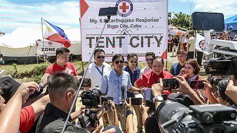 President Ferdinand Marcos Jr. returned to the earthquake-hit areas of Bogo City and San Remigio on Friday, Oct. 17, 2025, to inspect the delivery of aid and assure residents that all families affected by the magnitude 6.9 quake now have at least temporary housing. (Photo by Juan Carlo de Vela)