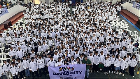 BATANG PINOY-READY. Davao City’s 713-member delegation poses during the send-off ceremony for the Batang Pinoy 2025 National Games at the Almendras Gym Davao City Recreation Center on October 20, 2025. The young athletes will compete in various events in General Santos City from October 25 to 31.