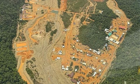 MINING DIALOGUE. Davao Oriental Governor Nelson Dayanghirang speaks with local officials during a dialogue in Barangay Macambol to address mining activities that damaged over 200 hectares of land and blocked a key road project. He urged collective action to stop the operations and protect the nearby Mount Hamiguitan Wildlife Sanctuary.