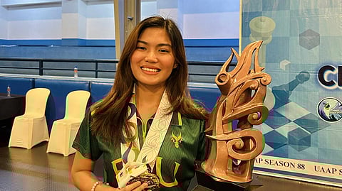 UAAP BOARD CHAMPION. Davao City’s woman national master (WNM) Samantha Umayan poses with her board 2 gold medal and Far Eastern University’s second runner-up trophy in the recently concluded University Athletic Association of the Philippines (UAAP) Season 88 Chess Championships