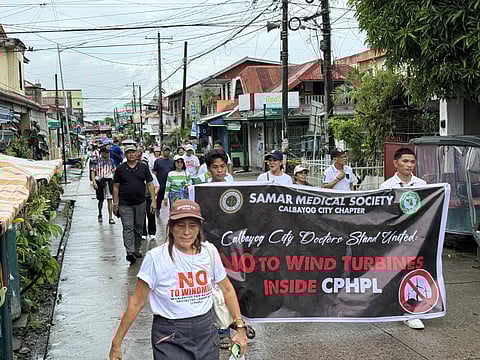 SAMAR. Calbayog City residents from all walks of life join a protest march against wind turbine project in the city on October 26, 2025.