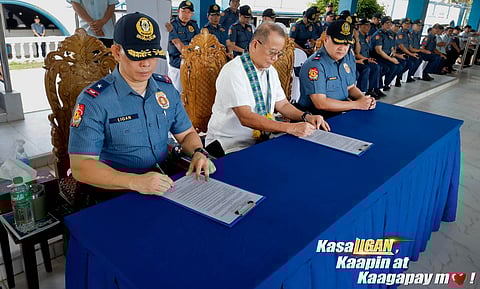 ILOILO. Provincial Administrator Dr. Raul N. Banias (center), representing Governor Arthur R. Defensor Jr., leads the turnover of P20.3 million to the Police Regional Office in Western Visayas (PRO 6) for the rehabilitation of its water system and the implementation of the Iloilo Police Provincial Office’s (Ippo) 4A’s Operation program during the Monday flag-raising ceremony at Camp Martin T. Delgado, Fort San Pedro, Iloilo City.