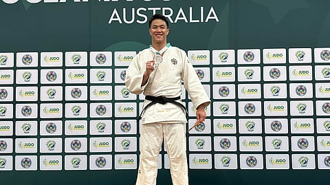 SILVER THAT SHINES LIKE GOLD. Filipino judoka Chino Sy Tancontian stands on the podium with his silver medal after placing second in the men’s –100-kilogram division at the Oceania Judo Open 2025 at Carrara Indoor Sports Stadium in Gold Coast, Queensland, Australia, Sunday, Nov. 2, 2025. The Davao City native’s performance comes as he prepares for the 2025 Southeast Asian Games in Thailand.