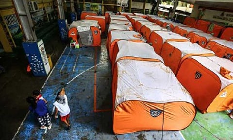 SAVING LIVES. Modular tents are set up in an evacuation center in Quezon City in this undated photo. The Department of the Interior and Local Government on Friday (Nov. 7, 2025) called on local government units to complete preemptive or mandatory evacuation of residents in high-risk communities by Sunday (Nov. 9), ahead of tropical cyclone Uwan, which may become a super typhoon. (PNA file photo by Joan Bondoc)
