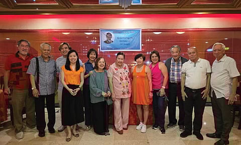 TEAM. The WeCare family led by president Ramon Sebastian. The group distributes rice and goodies every Christmas in selected barangays.