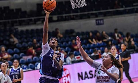 UNCONTESTED. Adamson University's Kemi Adeshina goes for a layup against UP's Mary Cris Mejasco in the UAAP Season 88 women’s basketball tournament at the SMART Araneta Coliseum in Quezon City on Sunday night (Nov. 16, 2025). Adeshina scored 18 points as the Lady Falcons won, 69-65. (UAAP photo)