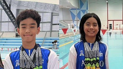 MOST OUTSTANDING SWIMMERS. Juan Raphael Estanislao (left) and Cassiel Auvene Cabico celebrate after winning multiple gold medals for Unit 6 at the Davao City Athletic Association (Dcaa) swimming meet at the Davao del Sur Sports Complex in Digos City on November 16, 2025.