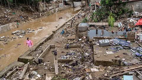 DAMAGED. Sta. Luisa Homes in Barangay Pit-os, Cebu City, suffered severe damage after Typhoon Tino battered Cebu early morning on November 4, 2025. Floodwaters submerged vehicles and houses in the community. / Juan Carlo de Vela