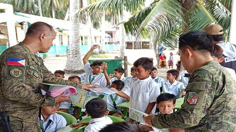 Book giving, feeding activity benefit 70 learners in Sulu island town