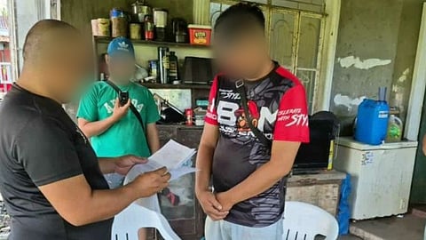 ILOILO. Operatives from the Kalibo Municipal Police Station and the Aklan Police Provincial Office Tracker Team arrest the province’s fifth most wanted person during an operation along Osmeña Avenue, Barangay Tigayon, Kalibo, Aklan, on November 27, 2025.