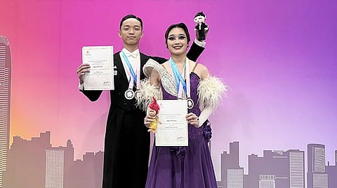 DAZZLING PAIR. Bhenz Rudolf Owen Semilla (left) of Francisco Bustamante National High School and Francheska Dezzly Darvin (right) of the University of the Immaculate Conception strike a pose after earning silver and bronze medals at the Hong Kong Open 2025. The pair, Palarong Pambansa 2025 standouts, continue to bring international recognition to Davao City through their dancesport achievements.