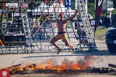 SPARTAN KING. Elias Tabac of the Philippines celebrates after winning the men’s 21K Spartan Beast race at Wisdom Valley Pattaya, Thailand, on November 30, 2025. The former SEA Games champion finished in 1 hour, 42 minutes, and 18 seconds, edging out Russia’s Stanislav Tikhomirov and Sergei Pyliaev. Tabac dedicated the victory to his late daughter, who would have turned seven on December 2.