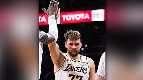 LeBron, Doncic steer Lakers to tight victory over Sixers
