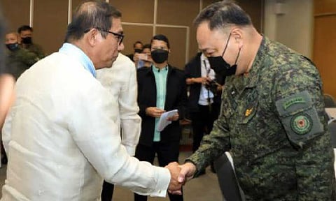 PARTNERSHIP. Maj. Gen. Adonis Bajao, then-Philippine Army (PA) vice commander (right), shakes hands with Department of Science and Technology Secretary Renato Solidum (left) during the signing ceremony for Project COBRA at the World Trade Center, Pasay City on Nov. 23, 2022. Project COBRA is set to be turned over to the Department of National Defense on Thursday (Dec. 11, 2025) in a ceremony at Camp O' Donnel, Capas, Tarlac. (Photo courtesy of the Philippine Army)