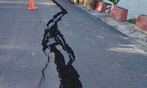 Damaged dike poses danger to residents