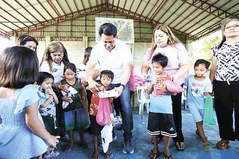 FOR THE CHILDREN. Cebu Vice Gov. Glenn Soco and Bogo City Mayor Mayel Martinez bring early Christmas cheer to the kids of Bogo who were affected by the Sept. 30, 2025 earthquake. /