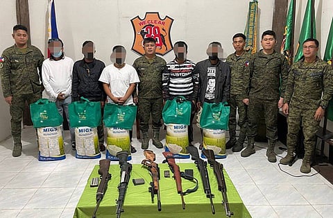ZAMBOANGA. Five terrorists, now regarded as “friends rescued,” voluntarily return to the folds of the law and surrender to the 38th Infantry Battalion on Friday, December 12, in Kablon village, Tupi, South Cotabato.