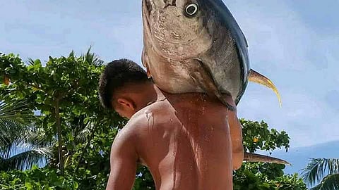 SUYANGAN. Fishing boats line the shore of Barangay Suyangan, Siargao Island, where the tradition of “dirami” continues to support students and fishermen through shared labor and community cooperation. / Photo courtesy: Siargao Island Through My Lens