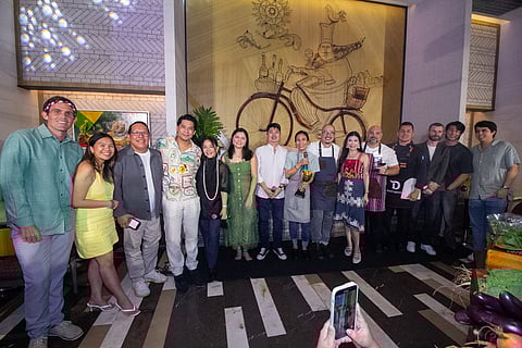 Kitchen Arena Champion Chef Rhea Rizzo poses with her trophy and Sula spirit bottle, joined by Monica Lorenzo of TLDC, Festival Chair Carmina del Rosario, the judging panel, event hosts, and key sponsors.