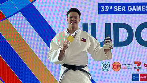 GOLDEN IPPON. Davao City’s Chino Sy Tancontian celebrates with his gold medal after winning the men’s judo -100kg final at the 33rd Southeast Asian (SEA) Games in Thailand on Saturday, December 13, 2025.