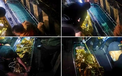 RETRIEVAL. Emergency responders recover the remains of former Department of Public Works and Highways Undersecretary Maria Catalina “Cathy” Cabral from a 30-meter ravine along Kennon Road in Tuba, Benguet shortly after midnight on Friday (Dec. 19, 2025). Department of the Interior and Local Government Secretary Juanito Victor "Jonvic" Remulla said there were no signs of foul play in Cabral's death based on the results of her autopsy. (Photo courtesy of Benguet PPO)