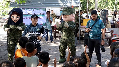 11ID brings holiday cheer to Minis Island residents