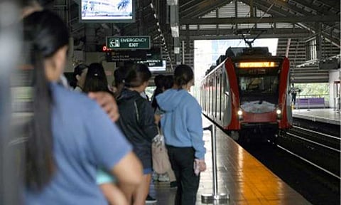 FREE RIDES. Commuters wait for their train at the Central Terminal station of the Light Rail Transit (LRT) 1 in Manila on Dec. 12, 2025. The Department of Transportation on Friday (Dec. 26) said the Light Rail Transit-1, LRT-2 and Metro Rail Transit-3 successfully served a total of 2,841,788 passengers from its “12 Days of Christmas - Libreng Sakay” (Free Rides) program from Dec. 14 to 25. (PNA photo by Yancy Lim)
