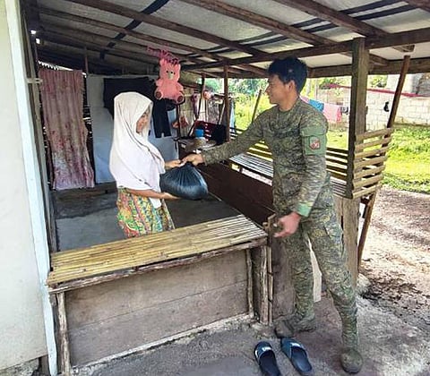 ZAMBOANGA. The Alpha Company of the Army’s 32nd Infantry Battalion on Saturday, December 27, conducts a Christmas outreach activity, benefiting 89 households in Pamatsaken village, Sumisip, Basilan province.