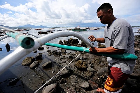 PALAWAN. A small-scale fisherman in Tagburos village in Puerto Princesa City, Palawan prepares for another day at sea in this June 2023 file photo. Palawan is one of the provinces in the Catholic-majority Philippines where fishermen continue to struggle to provide for their families. (Photo by Jimmy Domingo)