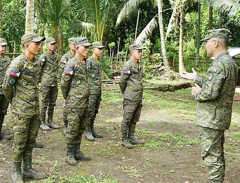 ZAMBOANGA. Brigadier General Emmanuel Cabasan, commander of the 1103rd Infantry Brigade, personally engages with members of the Citizen Armed Force Geographical Unit (Cafgu) in Indanan, Sulu, on Friday, January 2, taking time to talk with them and check on their morale and welfare.