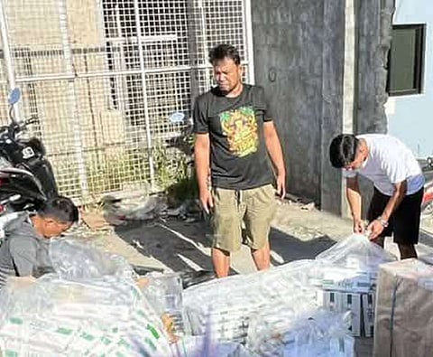 ZAMBOANGA. Lawmen seize a shipment of some P1.6 million worth of smuggled cigarettes in Baliwasan village, Zamboanga City, following a chase around 7:40 a.m. Friday, January 2.