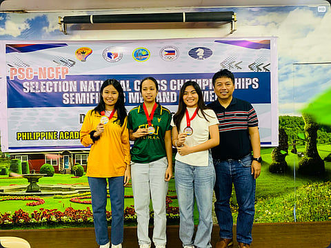 TOP THREE. From left, Far Eastern University (FEU) varsity scholars Lyn Getubig, LJ Getubig, Samantha Umayan, and Grandmaster Jayson Gonzales pose after the PSC–NCFP Selection National Chess Championship pre-finals at Philippine Academy for Chess Excellence (PACE) in Quezon City Sunday, January11, 2026. Dabawenya Umayan finished second, keeping her bid for the Philippine women’s national team alive.
