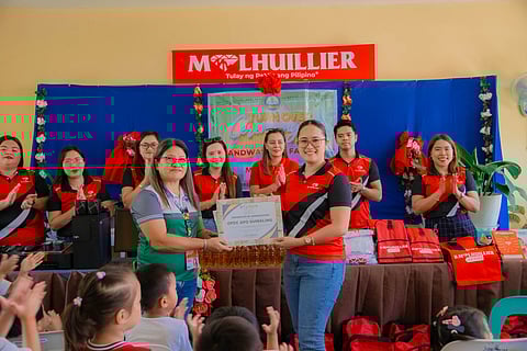 M Lhuillier turns on the tap to better health at Tubalan Elementary School