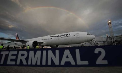 SCRAP TRAVEL TAX. A Philippine Airlines plane at NAIA Terminal 2 in this undated photo. Senator Raffy Tulfo has renewed his call for the removal of travel tax on Filipinos flying economy class, saying the levy adds an “undue financial burden” to ordinary travelers already paying multiple taxes. (PNA file photo by Avito Dalan)