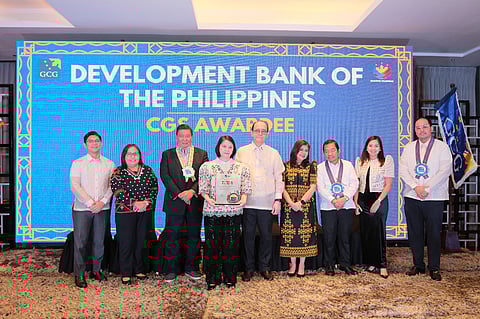 Development Bank of the Philippines (DBP) executive vice president Catherine Magana (fourth from left) holds an award from the Governance Commission for GOCCs recognizing the bank’s corporate governance initiatives. Also pictured, from left: National Privacy Commission chairman Johann Carlos S. Barcena, DBP senior vice president Soraya F. Adiong, former Senate President Franklin M. Drilon, GCG chairperson Marius P. Corpus, GCG commissioner Geraldine Marie B. Berberabe-Martinez, Department of Finance Undersecretary Rolando G. Tungpalan, DBP corporate secretary Maria Katrina L. Infante, and Department of Budget and Management assistant secretary Leonido J. Pulido III.