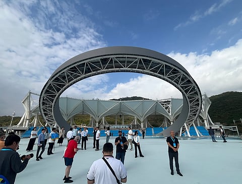 Journalists tour the Tianya Haijiao Ring Theater, the planned venue for the opening and closing ceremonies of the 6th Asian Beach Games, during a media visit in Sanya, China. The city will host the regional sports meet in April after a 10-year hiatus.