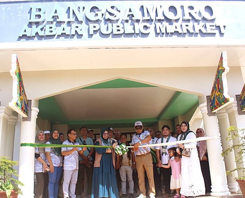 ZAMBOANGA. Mayor Alih Sali (in baseball cap) of Akbar, Basilan province, leads the inauguration of the town’s new public market, a landmark development expected to boost local trade and strengthen the municipality’s economic foundation.