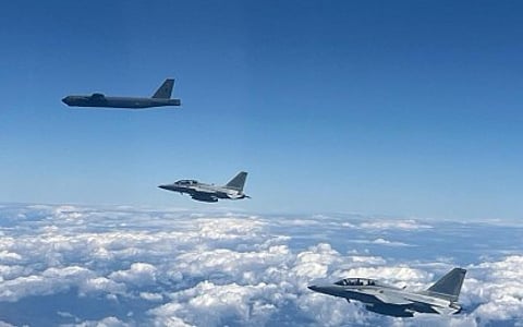 AIR PATROL. Philippine Air Force and US air assets fly a bilateral bomber air patrol over the West Philippine Sea on Friday (Feb. 6, 2026). The drill is part of ongoing efforts to boost interoperability between the two services. (Photo courtesy of PAF)