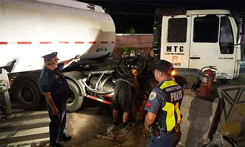 A fuel tanker leaked diesel and gasoline along Dumoy, McArthur Highway in Davao City on Thursday, February 12, 2026. The spill, originating from the tanker’s engine and not its cargo, posed hazards to motorists and nearby residents.